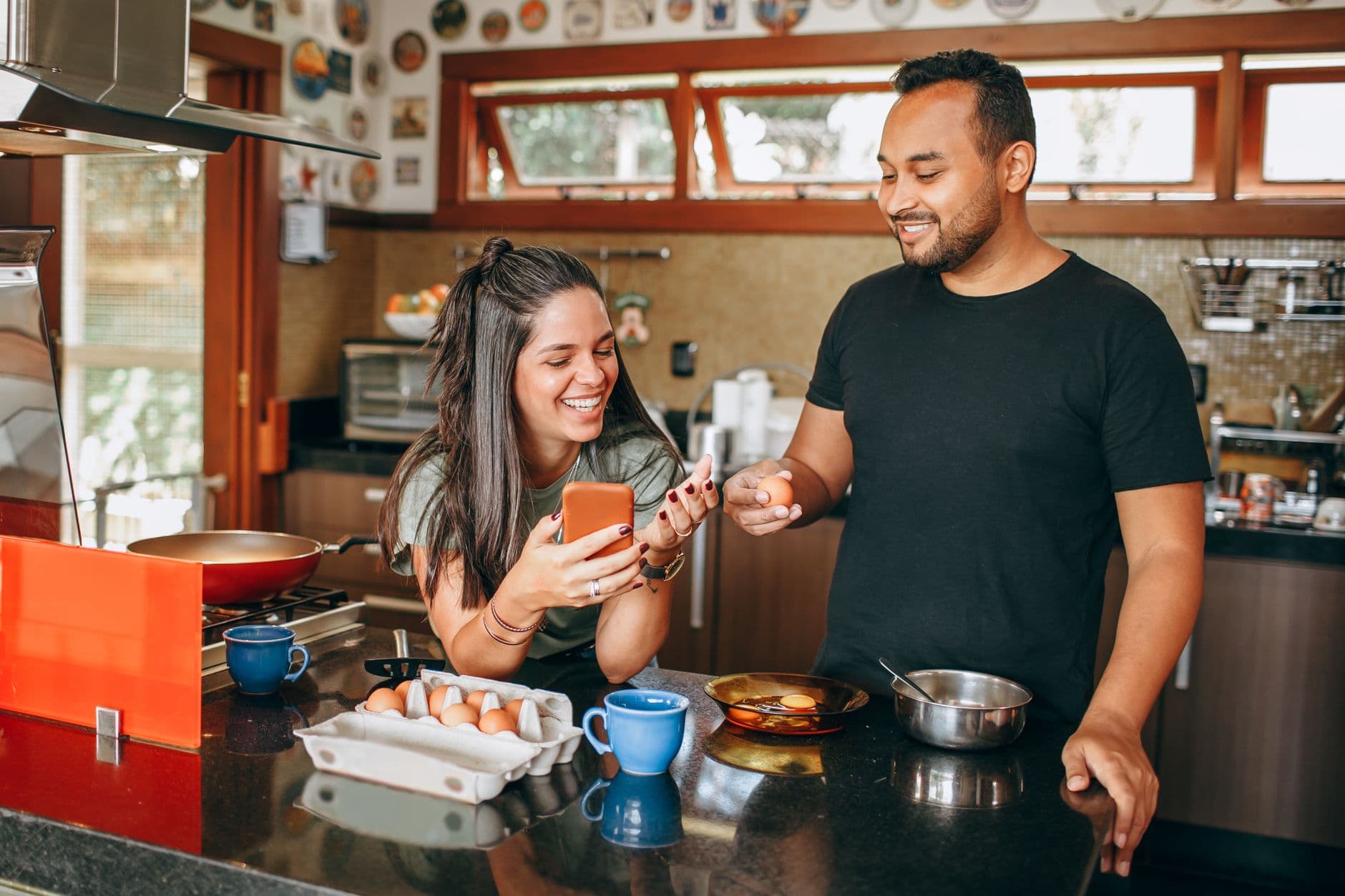Breakfast on a kitchen counter beside a smartphone