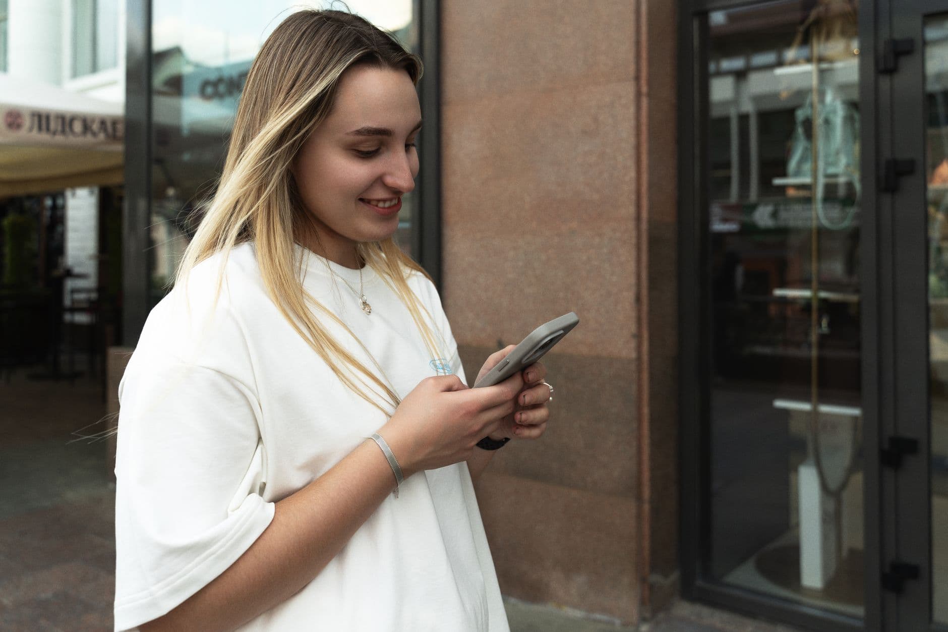 A woman checking a reminder notification on her phone