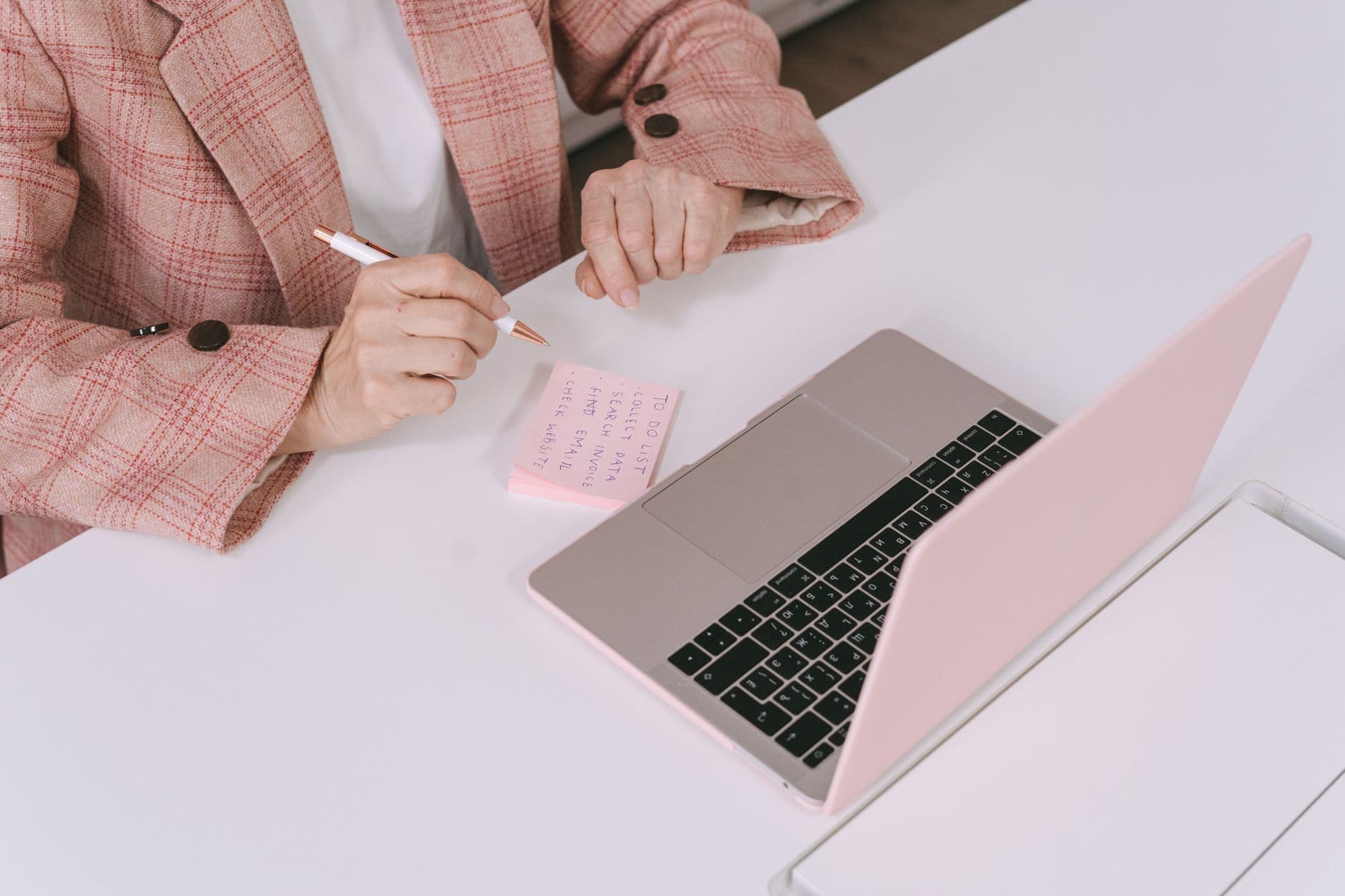 A man at a laptop preparing for a video interview